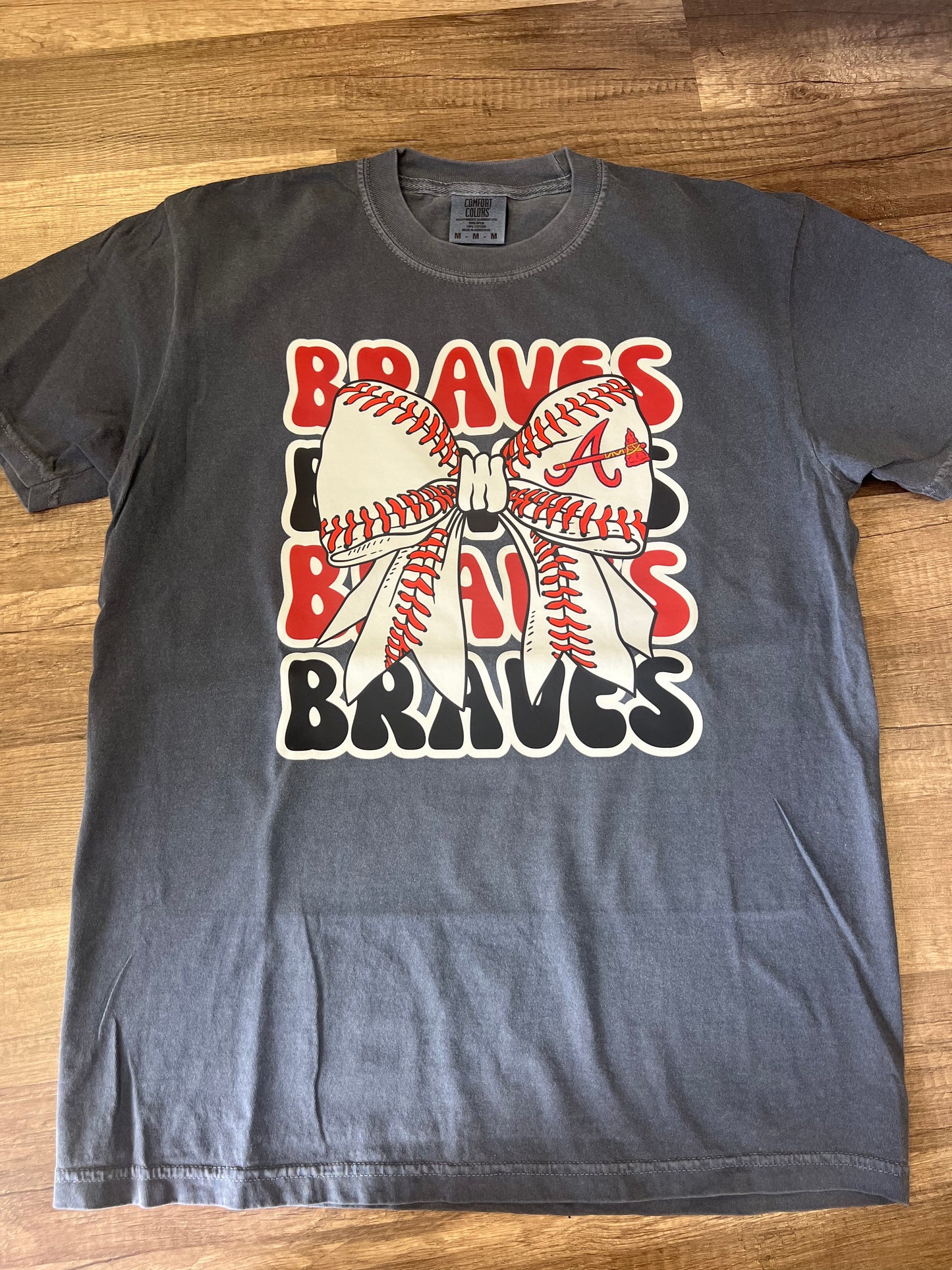 Braves with baseball bow stacked tee
