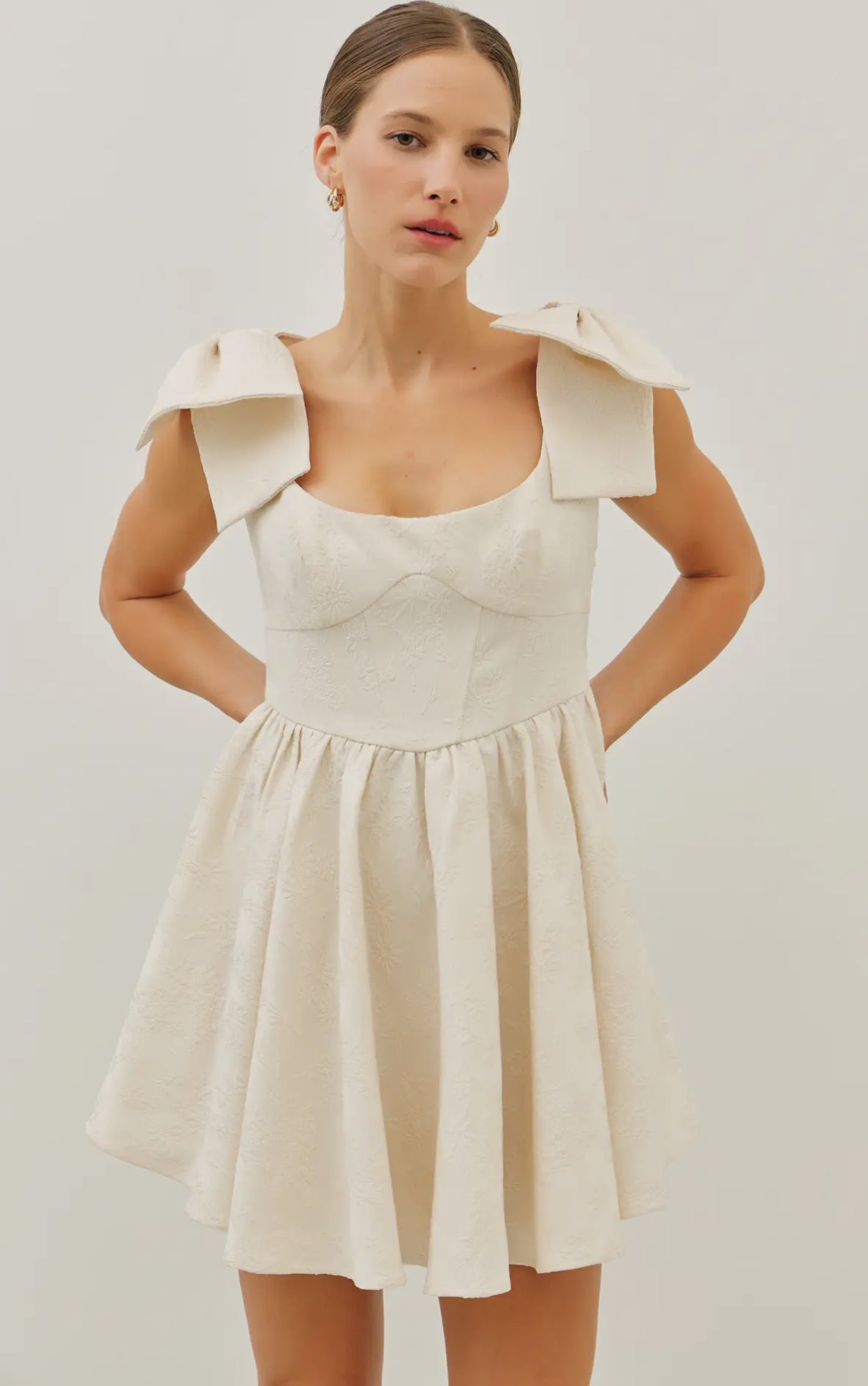 Lovely Textured Flare Mini Dress With Bow Straps-Cream