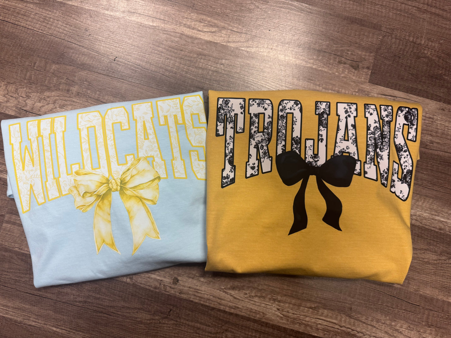 Trojans floral Tolie bow cc tee