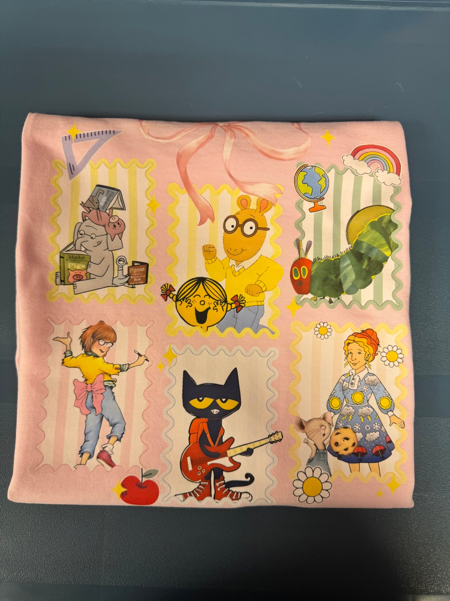 Character book collage pink cc tee