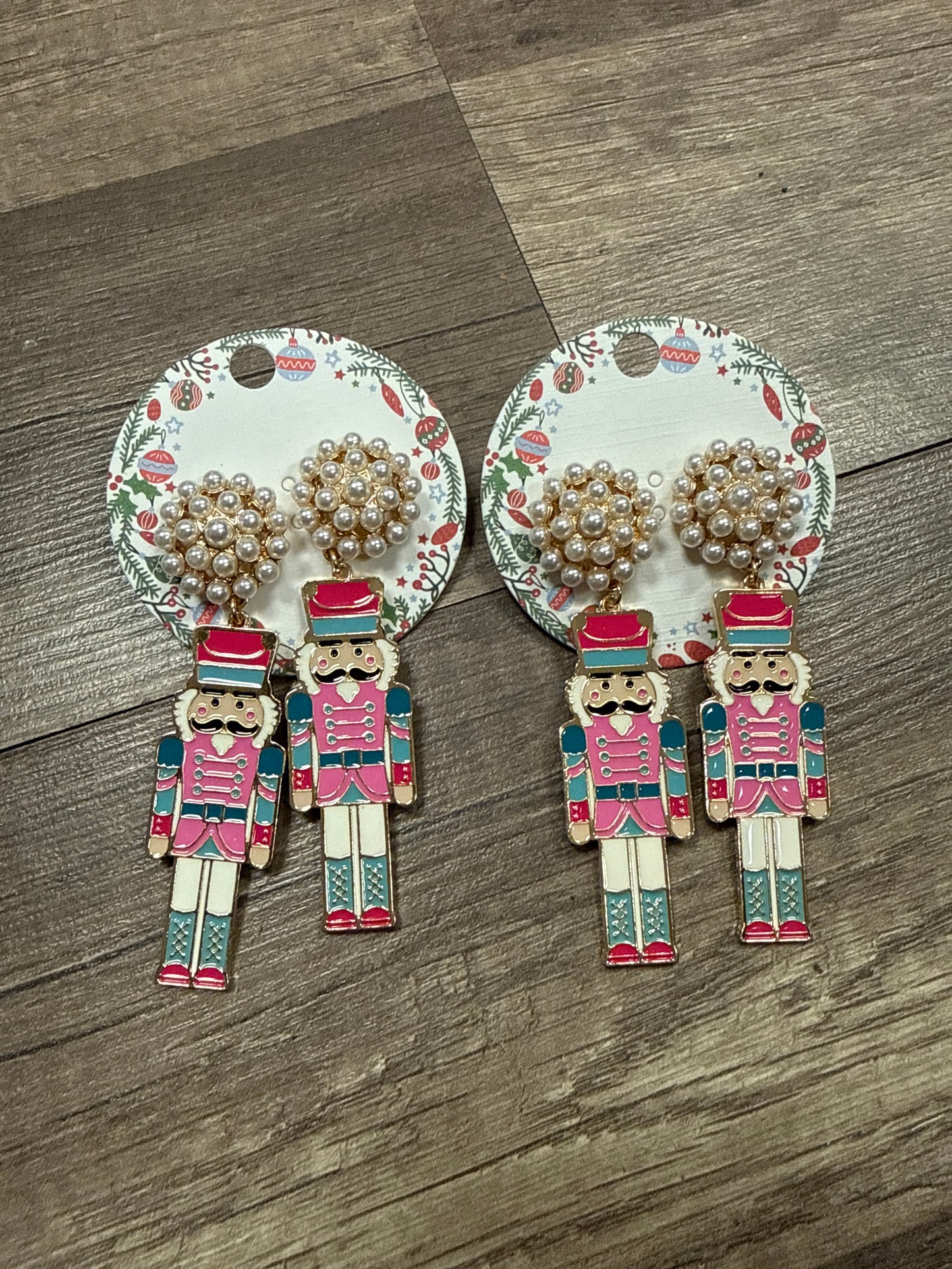 Nutcracker metal earrings with pearl stud