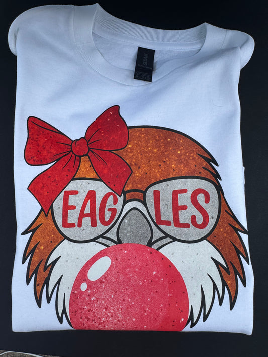 Eagles mascot blowing bubble gum on white