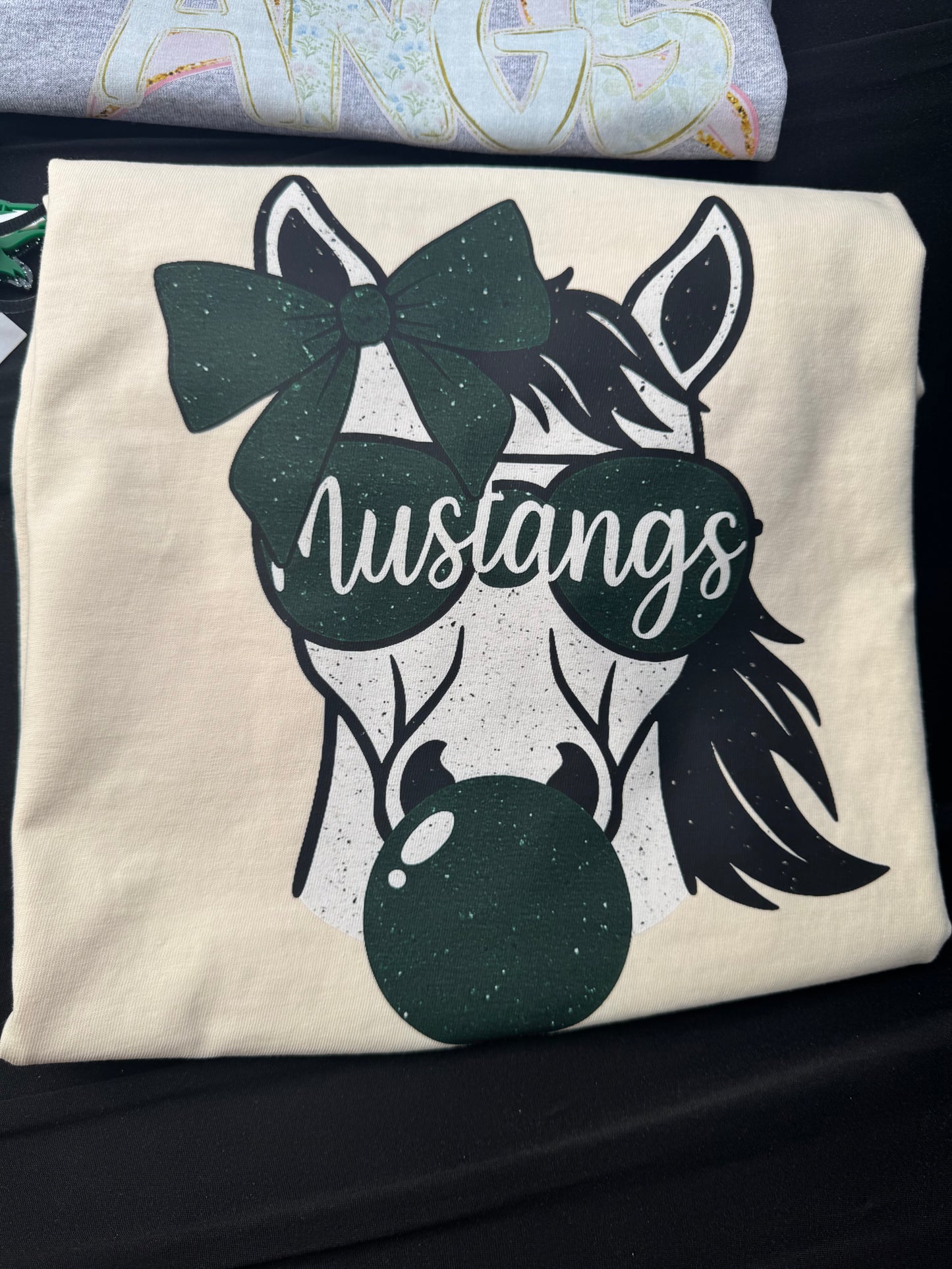 Mustangs Blowing Bubble Gum