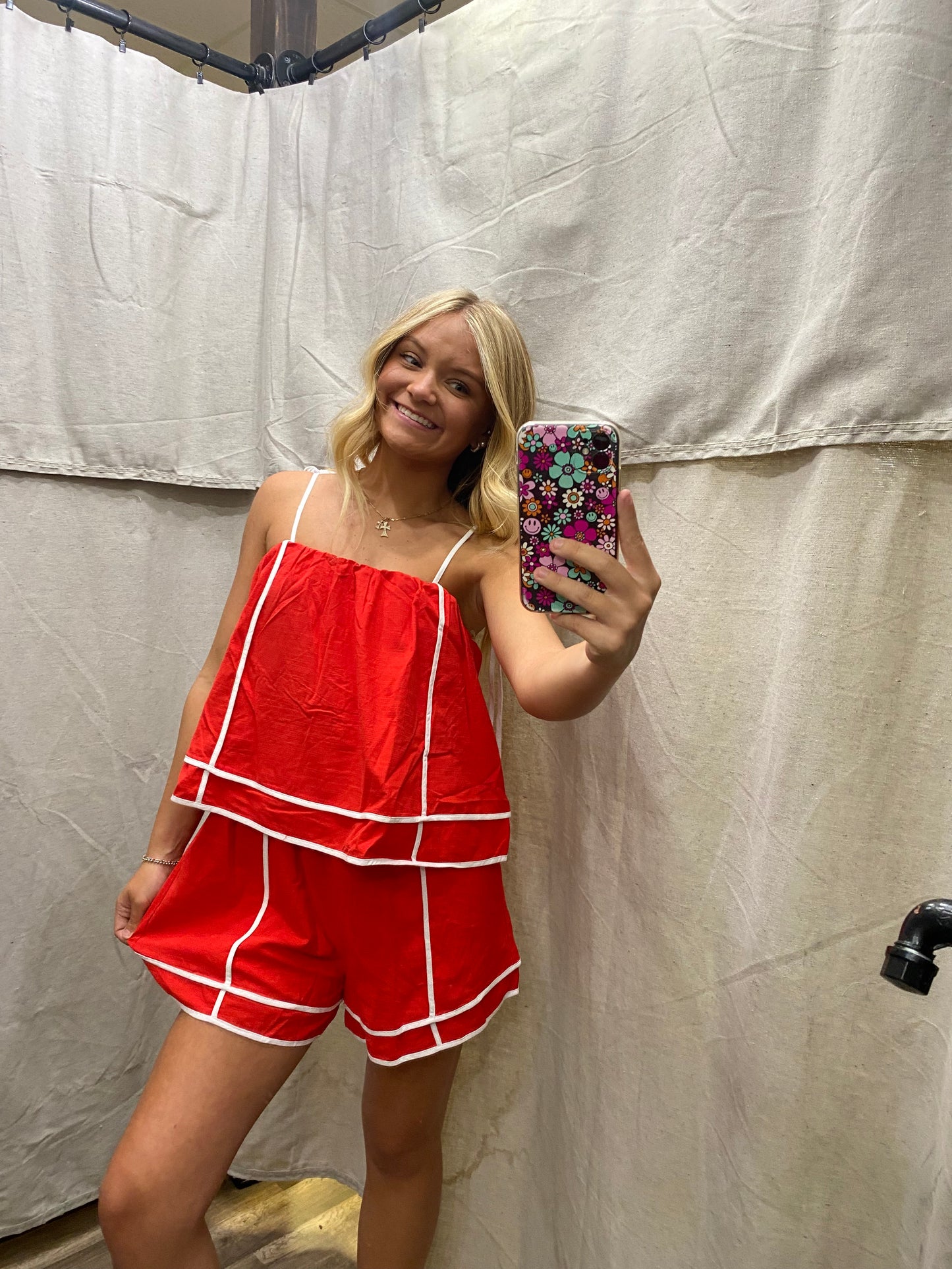 Red Solid shoulder tie pull-on romper featuring contrasting accented trim inset.