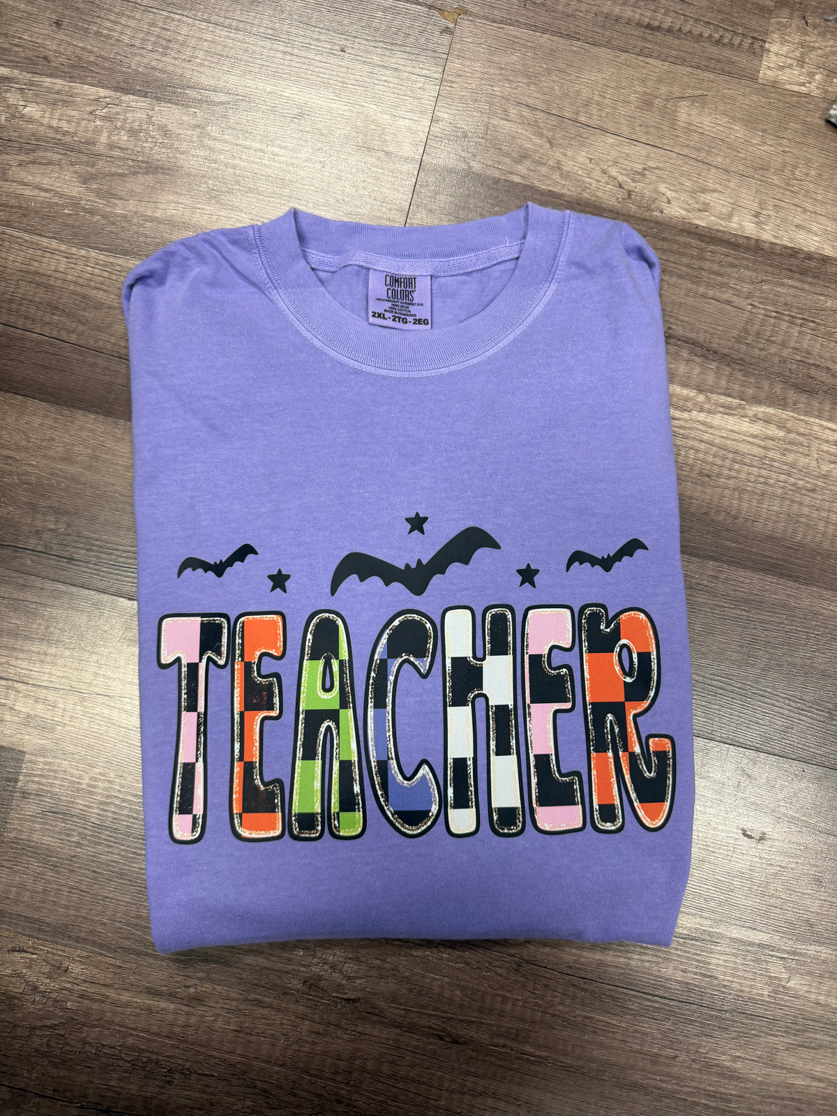 Teacher spooky on violet cc tee