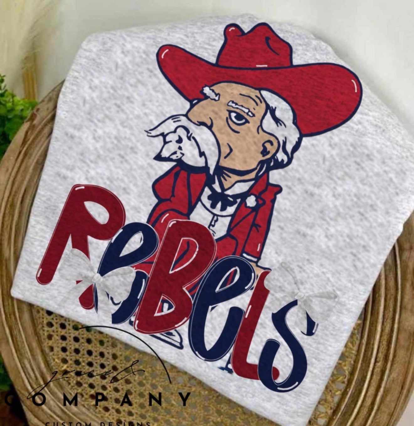 Ole Miss Rebels mascot with bow