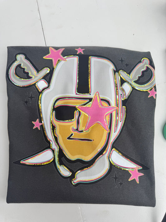 Raiders mascot girly with pink stars