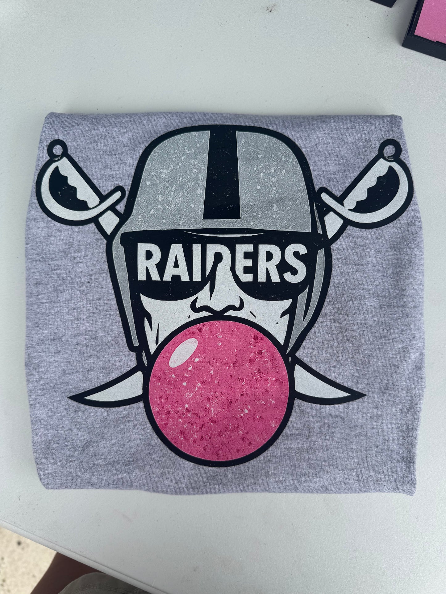 Raiders Blowing Bubble Gum