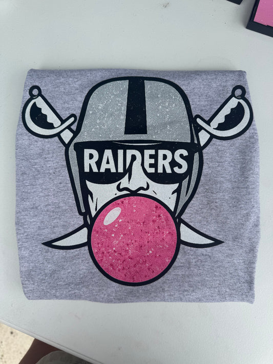 Raiders Blowing Bubble Gum