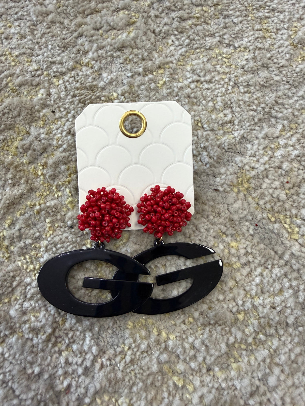 Acrylic G earrings with red beaded stud