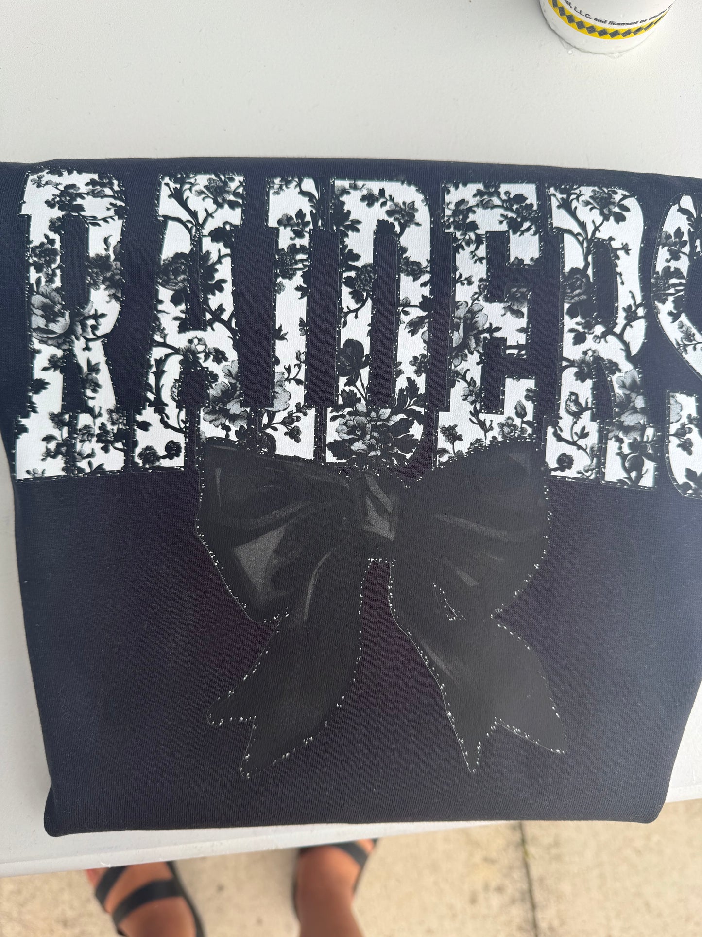 Raiders Floral Tolie on black