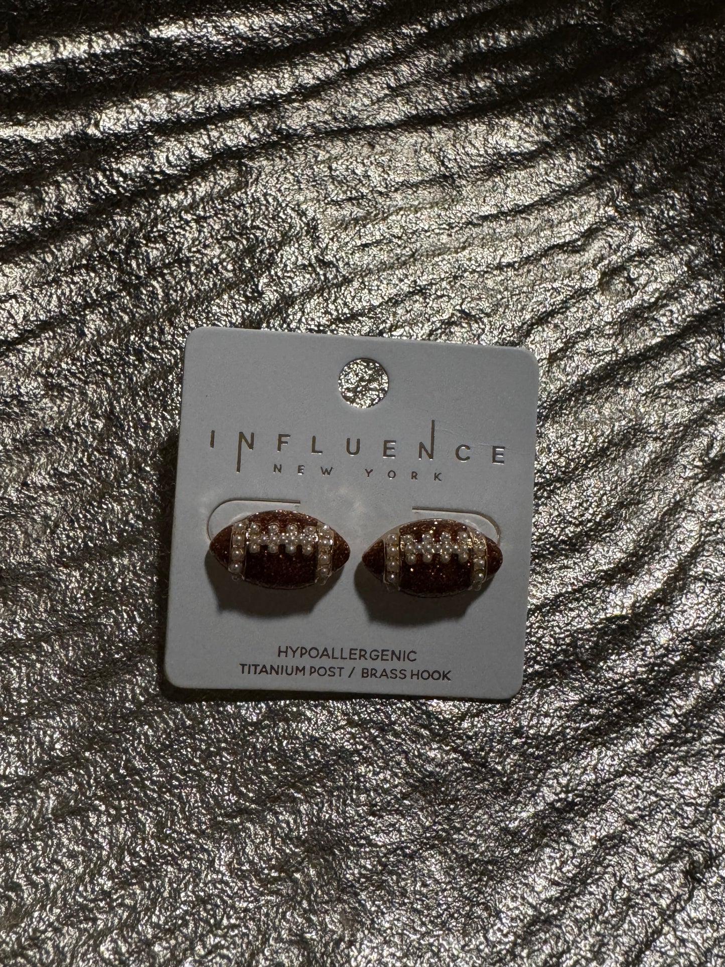 Football with pearls studs