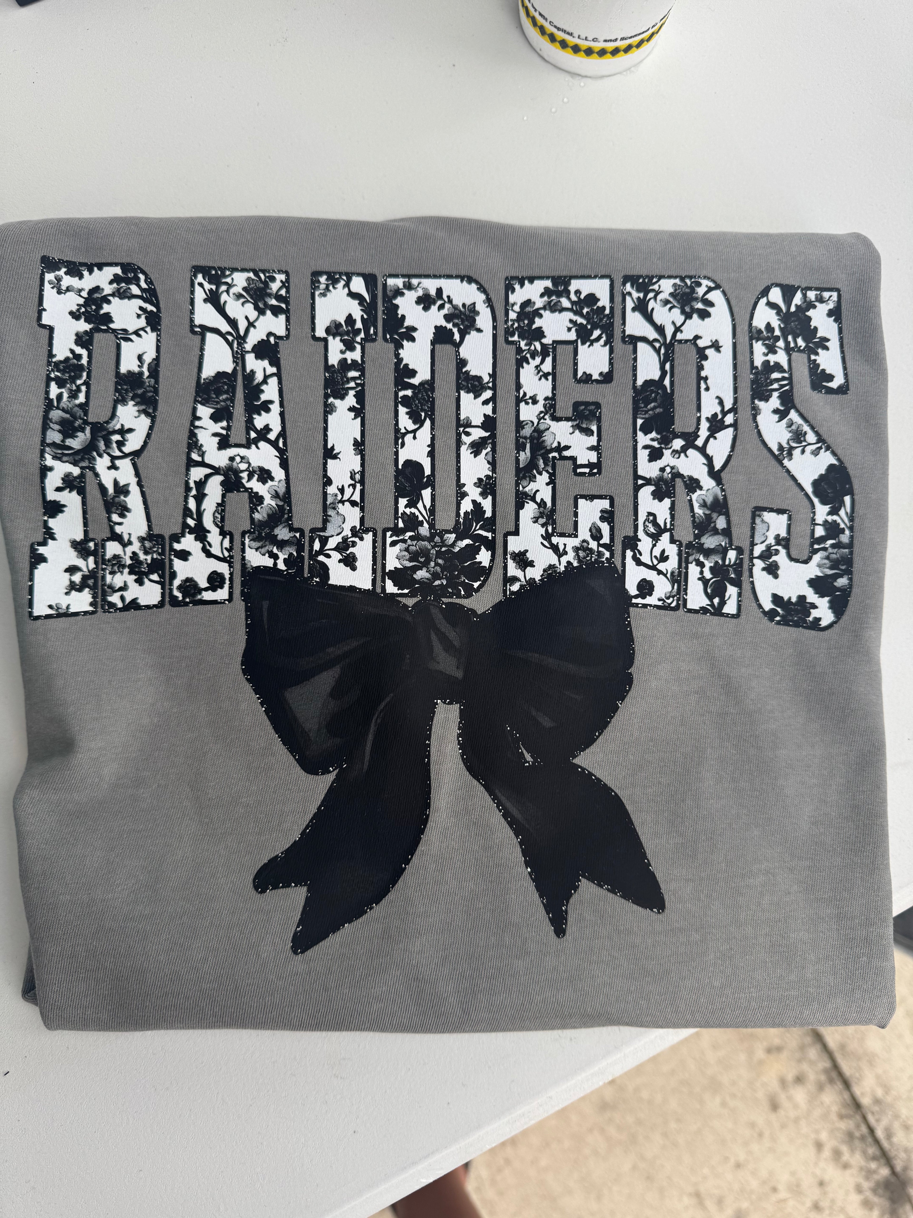 Raiders floral tolie bow on grey