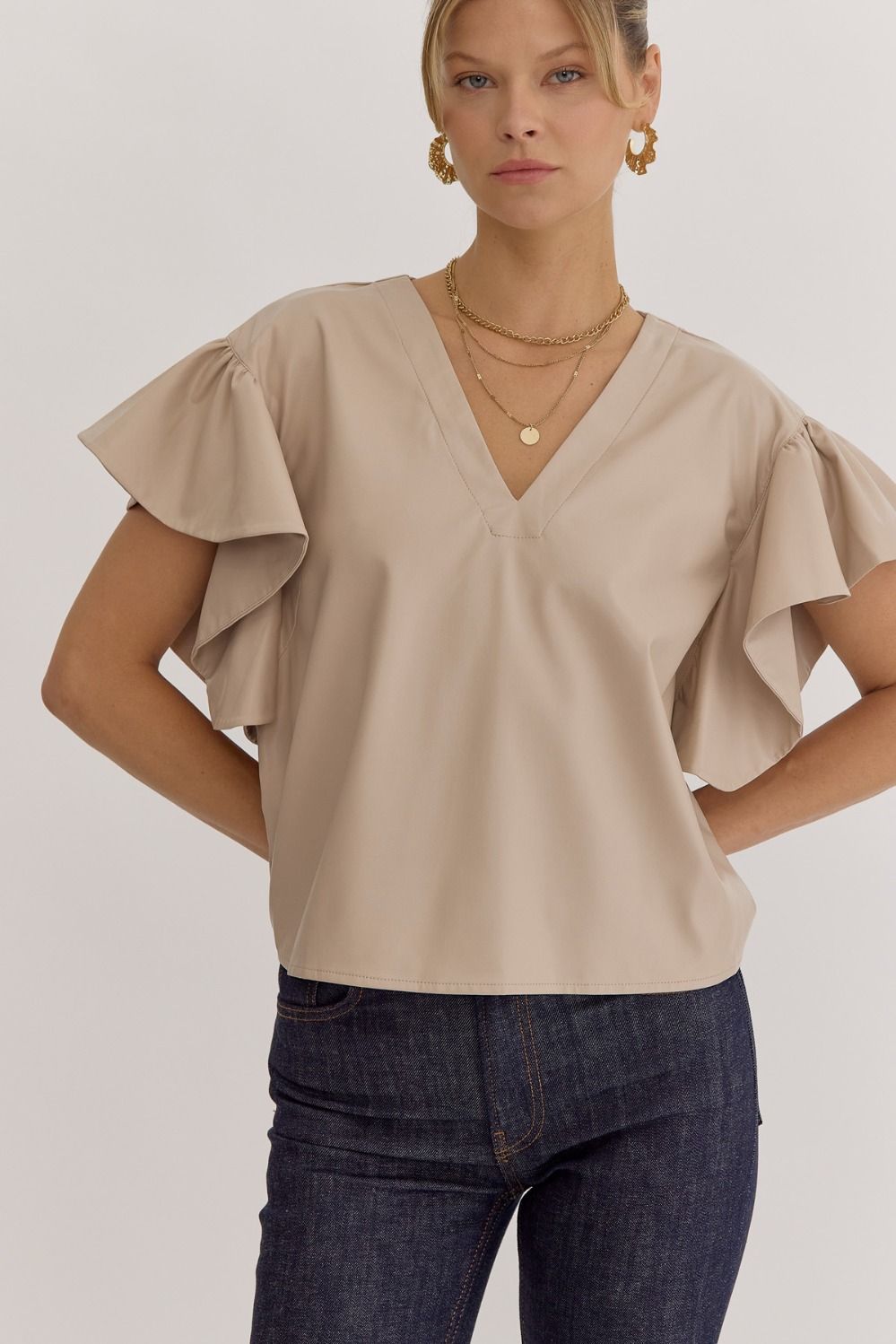 Taupe Solid faux leather v-neck ruffle sleeve top featuring cut out and button closure at back