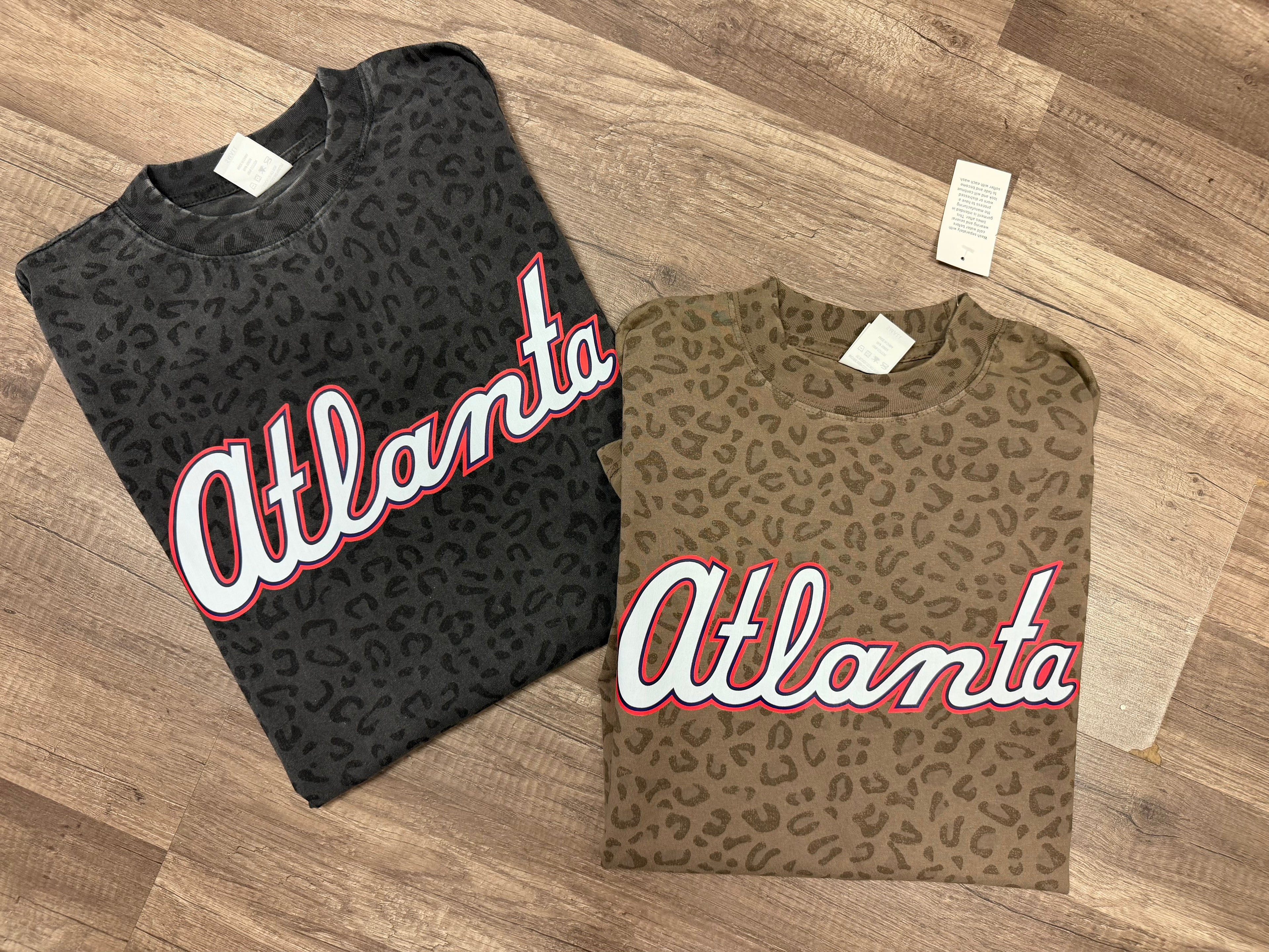 Atlanta logo on dark leopard tee