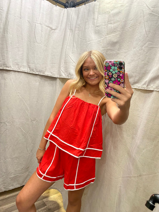 Red Solid shoulder tie pull-on romper featuring contrasting accented trim inset.
