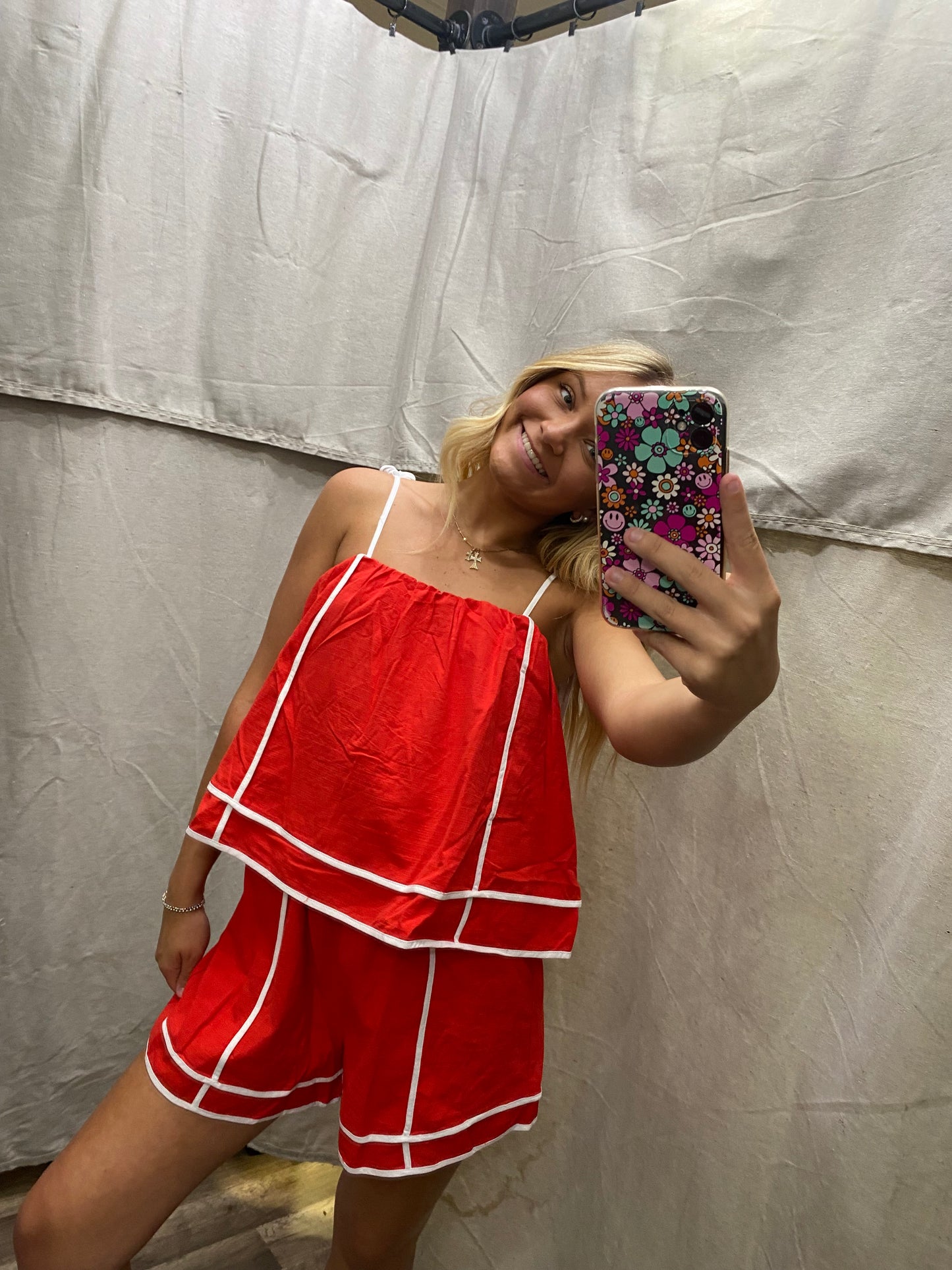 Red Solid shoulder tie pull-on romper featuring contrasting accented trim inset.