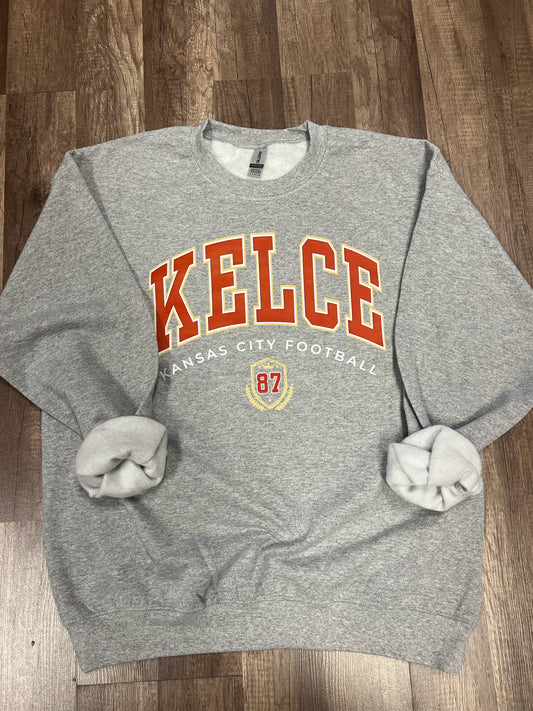 Kelce sweatshirt on grey