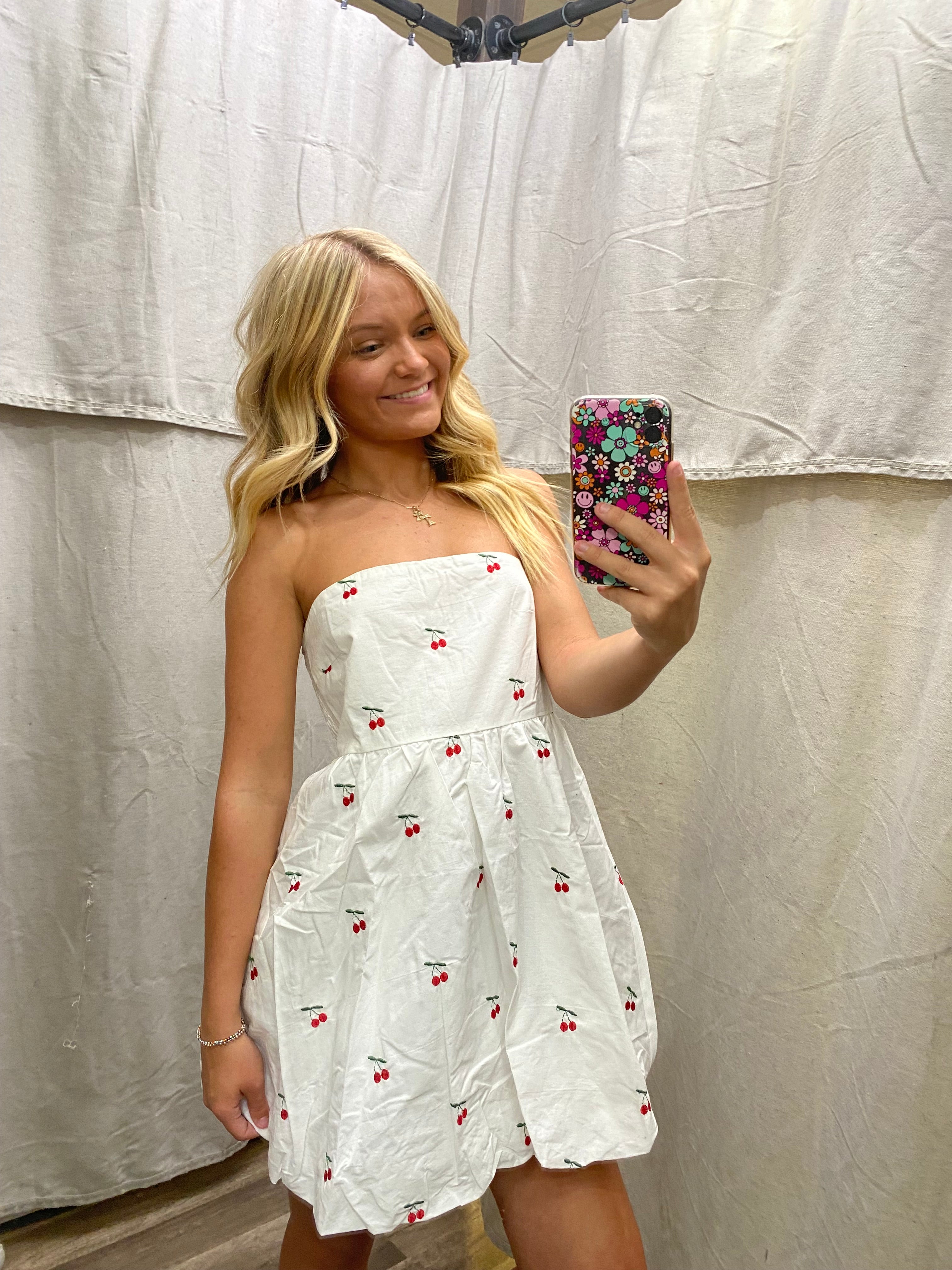 Strapless bubble hem cherry mini dress