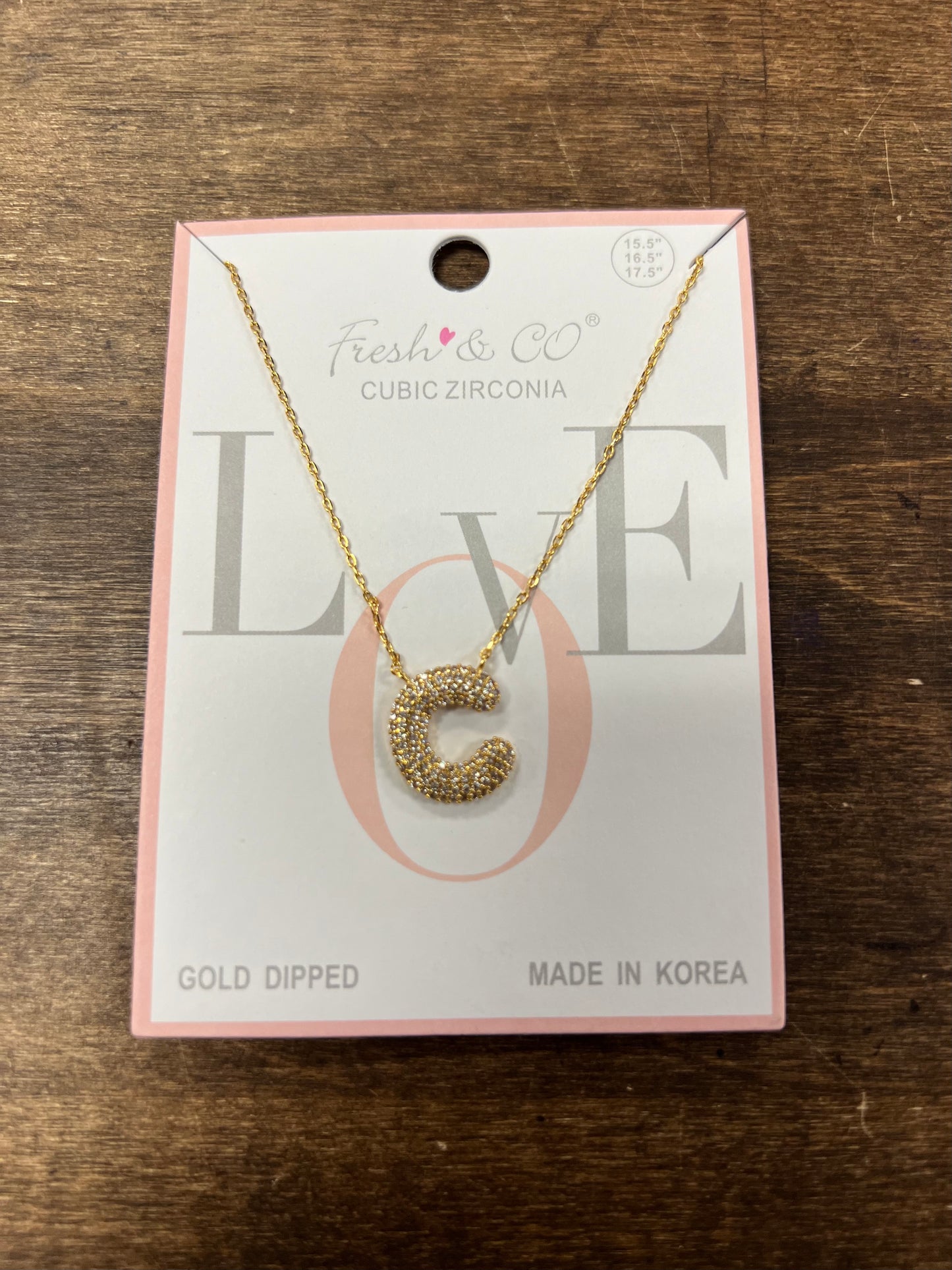 Gold bubble letter necklace with rhinestones