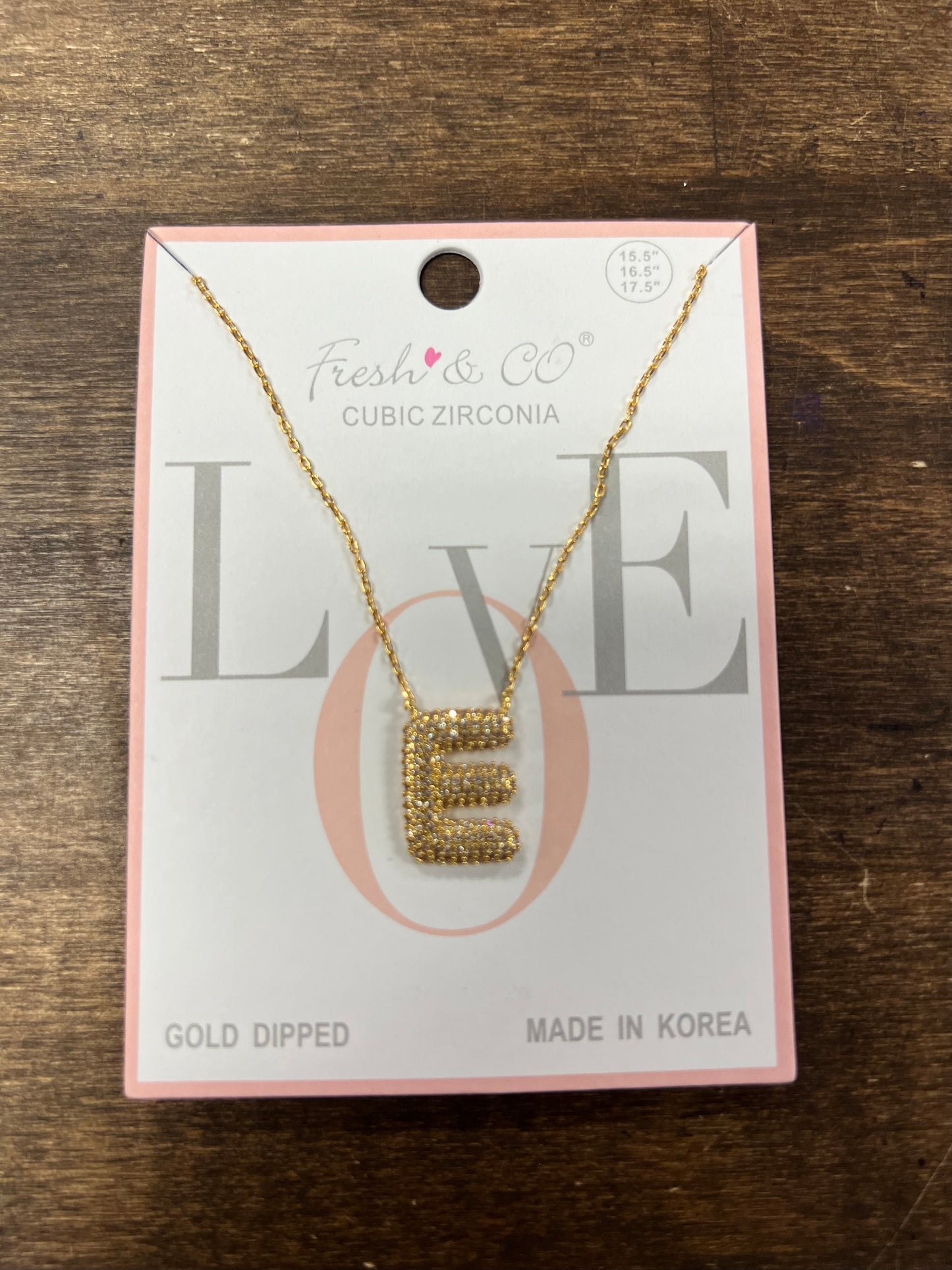 Gold bubble letter necklace with rhinestones