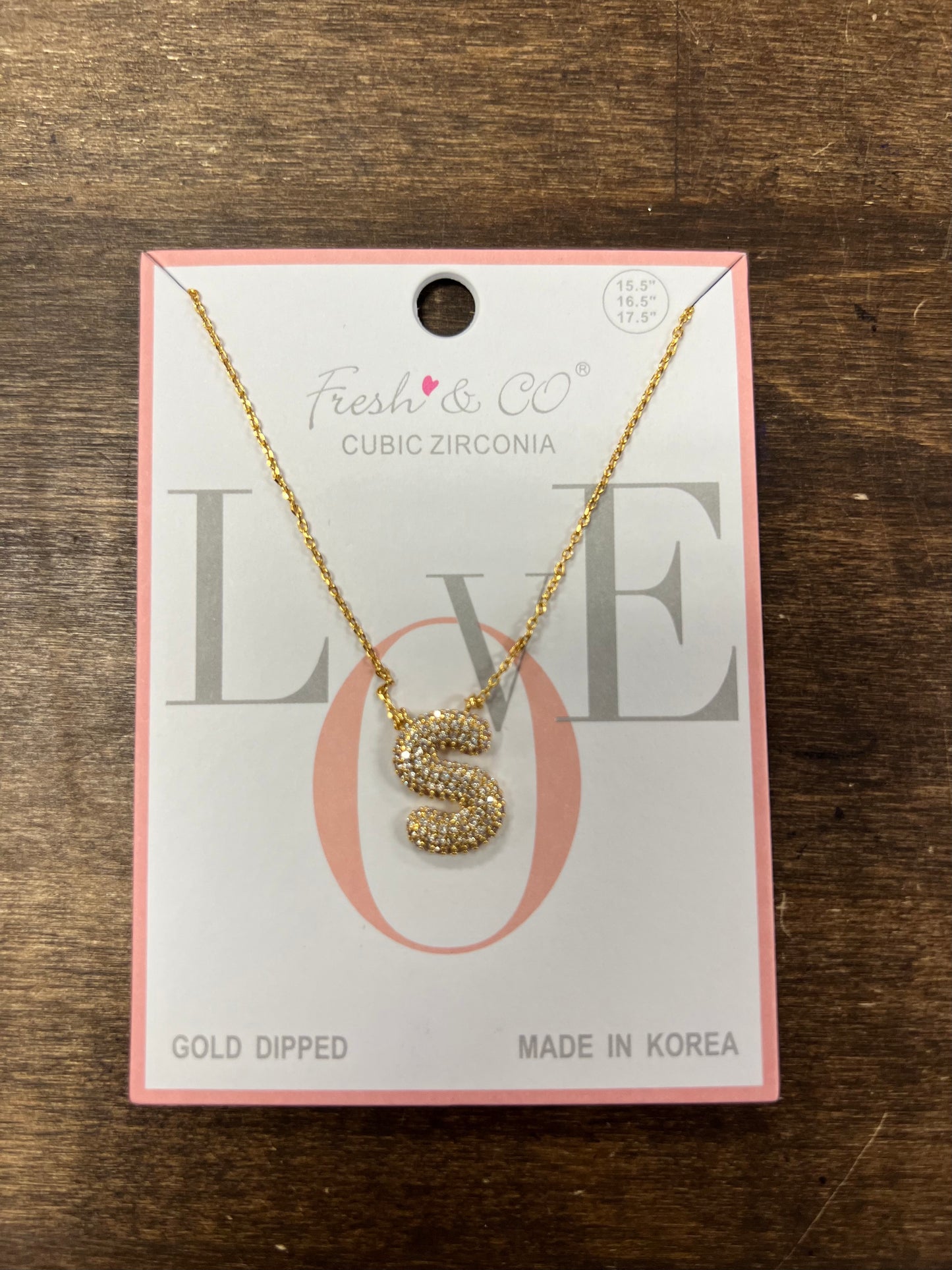 Gold bubble letter necklace with rhinestones