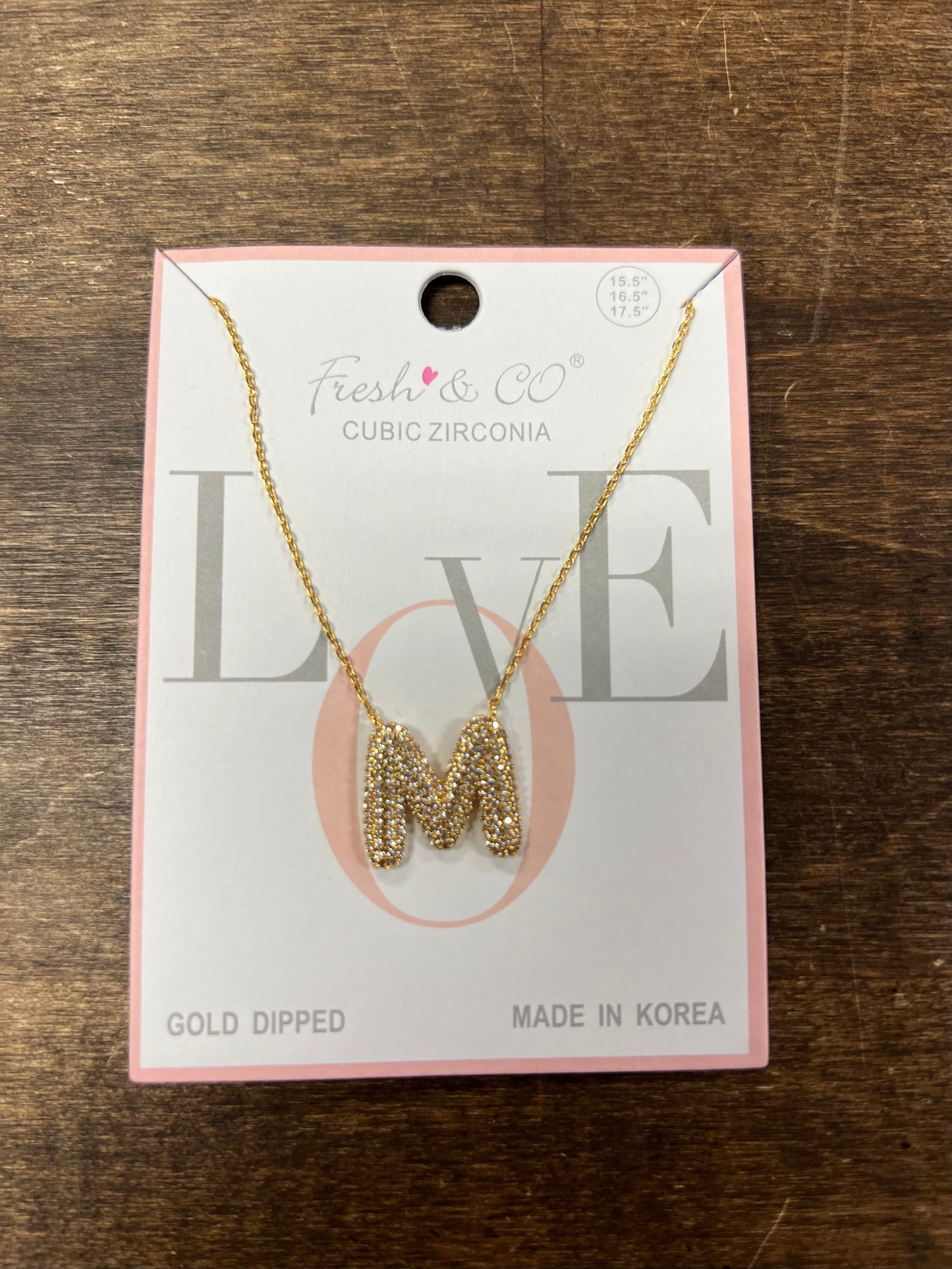 Gold bubble letter necklace with rhinestones