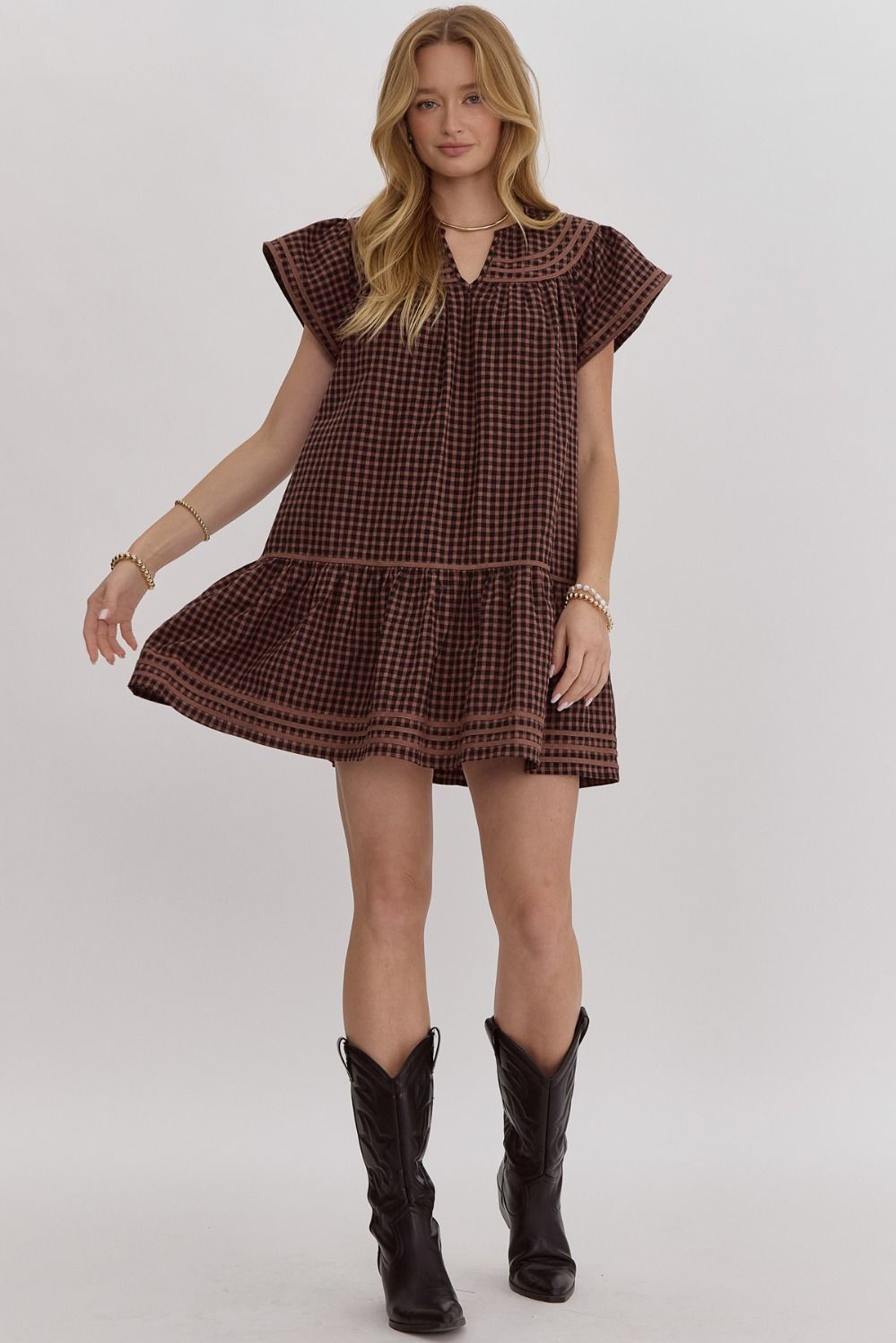 Gingham v-neck short sleeve mini dress featuring solid trim.